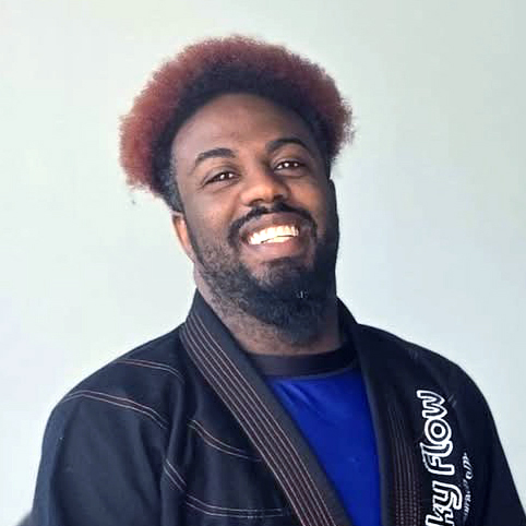 Instructor Chris Woodberry smiling after a class.